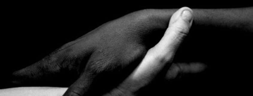 an image of two hands clasped together